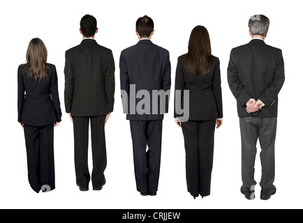 five people in suits stiffly standing with their backs to the camera Stock Photo
