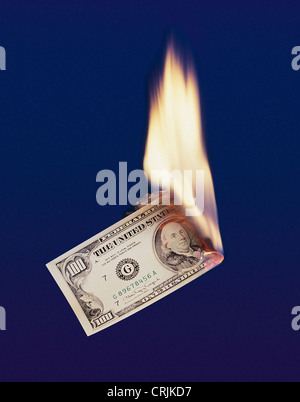 burning 100 Dollar bill Stock Photo