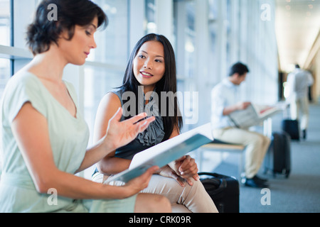 Business people talking in hallway Stock Photo