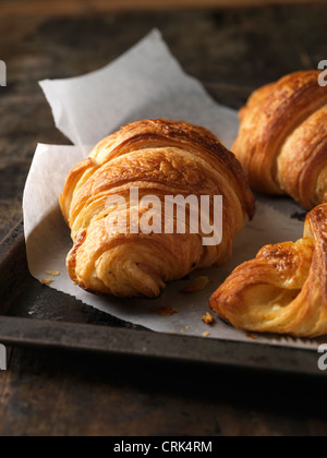 Close up of croissants on tray Stock Photo