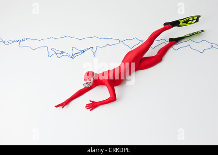 Woman in bodysuit posing in fins Stock Photo