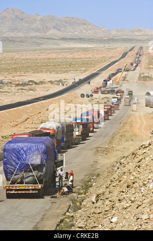 Traffic jam of mostly commercial trucks/vehicles along the G30 Lianhuo expressway in China and still being constructed in places Stock Photo