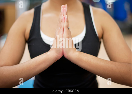 Close up of womans clasped hands Stock Photo