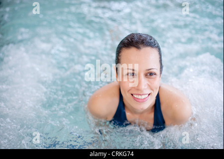 Hispanic Woman Relaxing In Bubble Bath Stock Photo Alamy