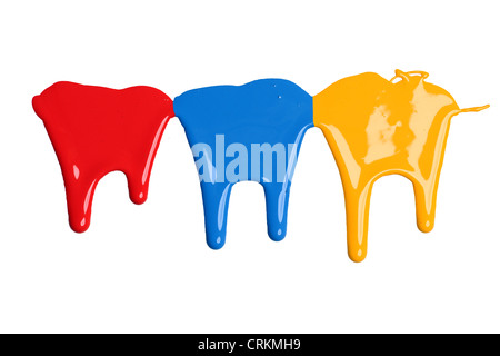 Red, blue, and yellow paint dripping isolated over white background Stock Photo