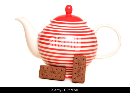 teapot and bourbon biscuits studio cutout Stock Photo