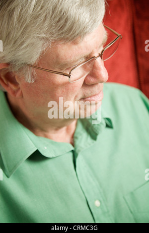 A senior man relaxing at home. Stock Photo