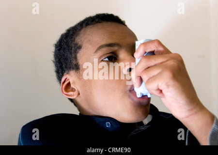 An inhaler or puffer is a medical device used for delivering medication into the body via the lungs. It is mainly used in the treatment of asthma and Chronic Obstructive Pulmonary Disease (COPD). Stock Photo