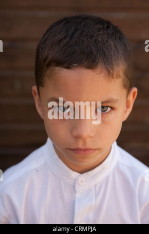 little boy with serious expression Stock Photo