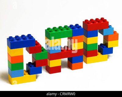 Coloured plastic building bricks spelling the word Dad Stock Photo