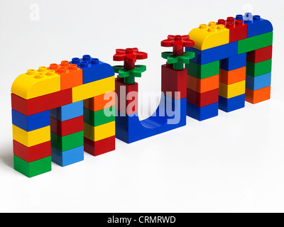Coloured plastic building bricks spelling the word Mum Stock Photo