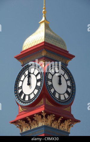 The freshly painted victorian Jubilee clock tower on Weymouth seafront was erected in 1887 to mark fifty years of Queen Victoria’s reign. Dorset, UK. Stock Photo