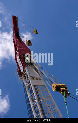 Compound Pulley Systems on the boom of a Heavy Lifting Crane against a blue sky Stock Photo