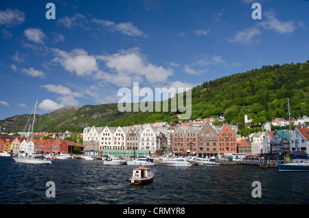 Norway, Bergen. Downtown old Hanseatic historic area of Bryggen, UNESCO World Heritage Site. Wooden buildings along harbor. Stock Photo