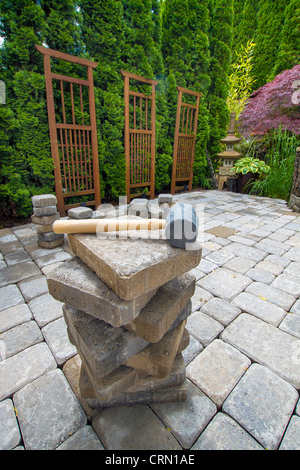 Stack of Cement Pavers On Backyard Patio for Garden Landscaping Stock Photo