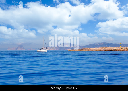 Espalmador in Formentera island with Gastabi lighthouse and Ibiza in background Stock Photo