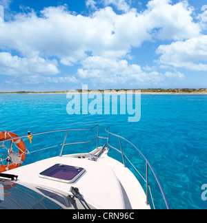 Boat in Formentera island transparent water on llevant beach Stock Photo