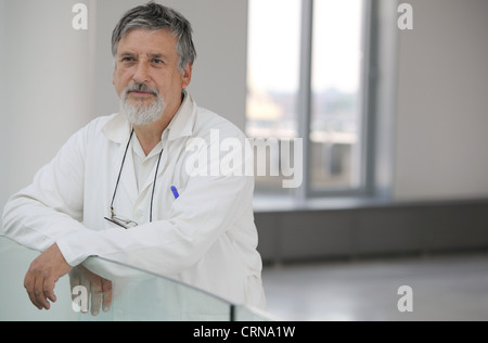 Renowned scientist/doctor in a research center/hospital looking confident Stock Photo