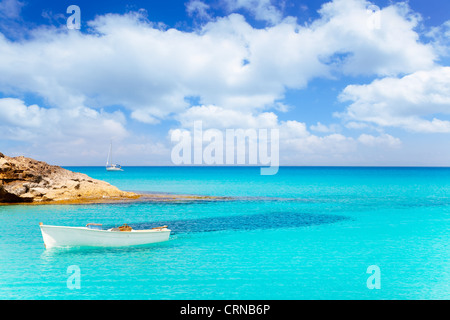 Es Calo de San Agusti with boat in Formentera island turquoise mediterranean Stock Photo