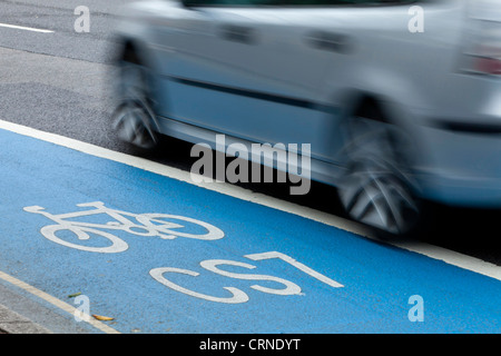 A cycle lane defined by colour and symbols in the London Borough of Southwark. Stock Photo