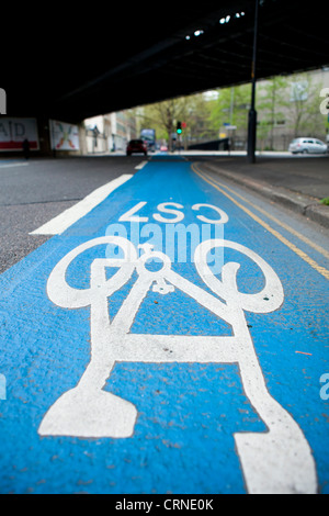 A cycle lane defined by colour and symbols in the London Borough of Southwark. Stock Photo