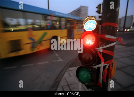 Red light and turning right gender bus at night Stock Photo