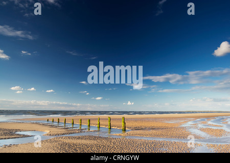 Brancaster beach at low tide in late evening light. Stock Photo