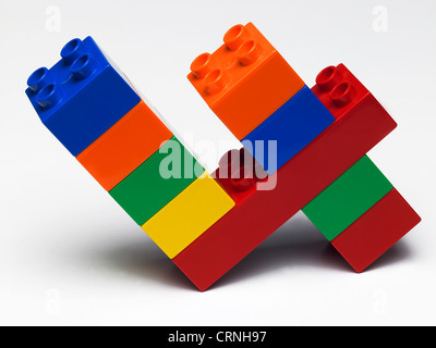 Coloured plastic building bricks in the shape of the number 4 Stock Photo