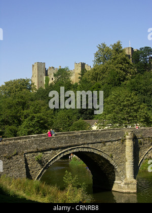 Dinhan Bridge and the River Teme with Ludlow Castle beyond. The castle was built by the Normans in the late 11th century as one Stock Photo