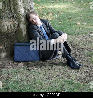 A homeless business man in the park Stock Photo - Alamy