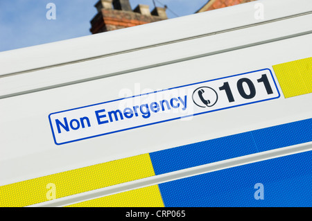 Non emergency telephone number 101 on the side of a police van. Stock Photo