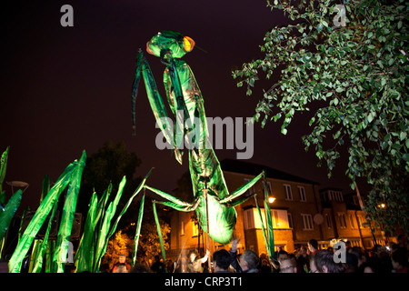 Giant mechanical insects invade Bow’s Roman Road for the Greenwich and Docklands International Festival, London, England, UK. Stock Photo