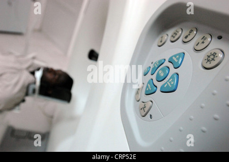 CT Scan control room and computer showing brain scan, Medical ...