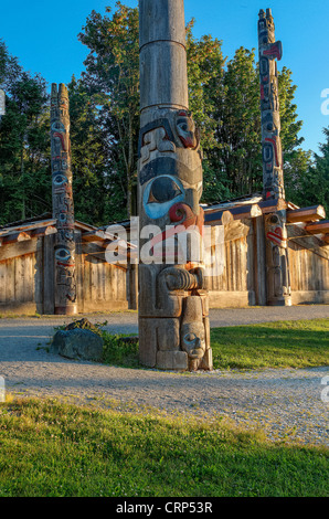 Totem poles and long house, Museum of Anthropology, (MOA) University of British Columbia, Vancouver, British Columbia, Canada Stock Photo