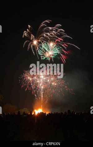 Crowds enjoying the annual bonfire night fireworks display at Hatch Beauchamp. Stock Photo