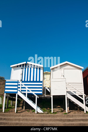 Traditional beach huts along the seafront at Walton-on-the-Naze. Stock Photo