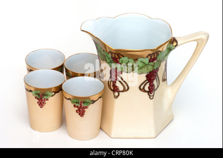 Antique hand painted lemonade grape juice pitcher cup set from Germany Stock Photo