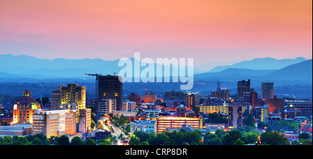 Asheville, North Carolina skyline nestled in the Blue Ridge Mountains.