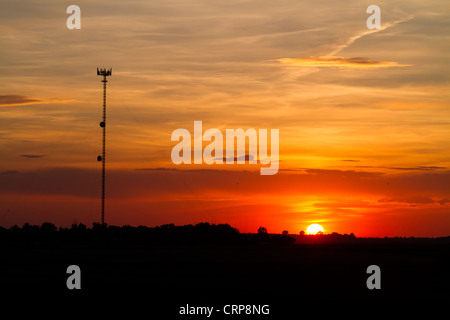 Cell Phone Tower at Sunset Stock Photo