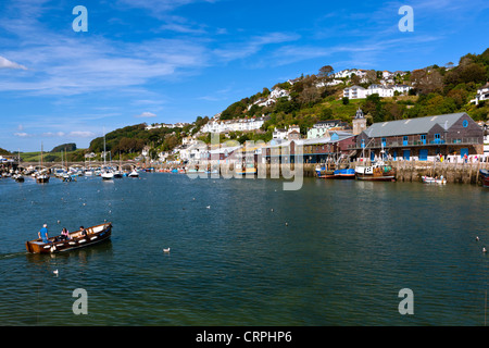 Small ferry carrying passengers across the River Looe to East Looe. Stock Photo