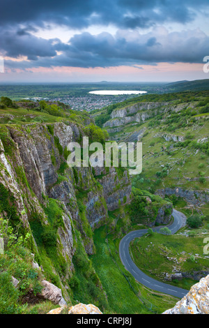 View down to a winding road through the Cheddar Gorge, a limestone gorge in the Mendip Hills, part of a Site of Special Scientif Stock Photo