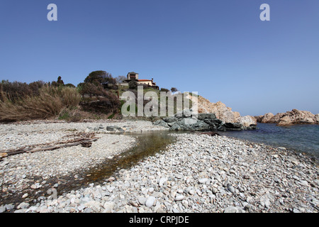 The stoney beach by the skete of Mylopotamos at Mount Athos, Greece. Stock Photo