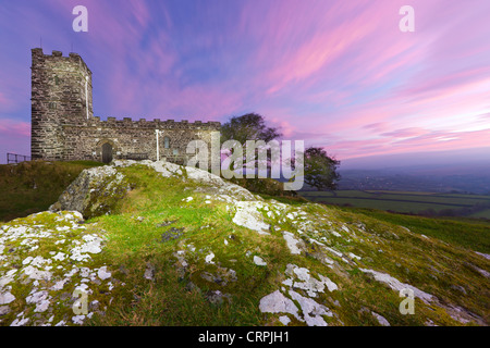 The Church of St Michael, dating from the 13th century on top of Brent Tor on the edge of the Dartmoor National Park. Stock Photo