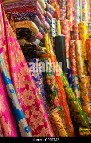 Colourful rolls of silk fabric in the Western-Central Asia Market ( Bazaar) of Kashgar. Stock Photo