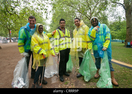 Team of men collecting litter after Diamond Jubilee event Stock Photo