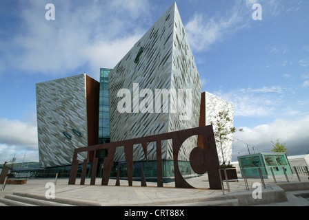 Elevated side view of Titanic Belfast visitor center, Titanic Building, Titanic name cut from sheet steel,  Aluminum cladding