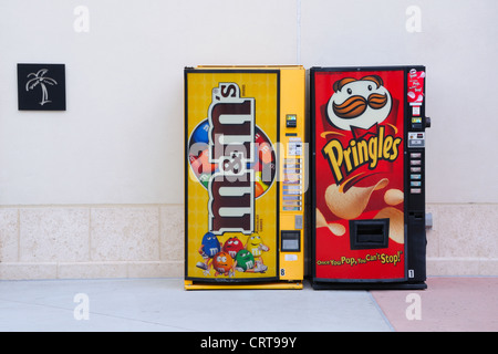 m&m's and Pringles vending machines at an outlet mall Stock Photo