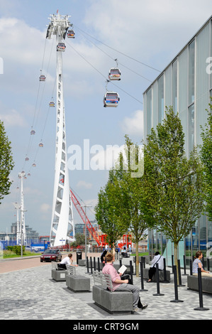 Emirates Air Line sponsored cable car service crossing the River Thames between Greenwich Peninsula and Royal Docks Stock Photo