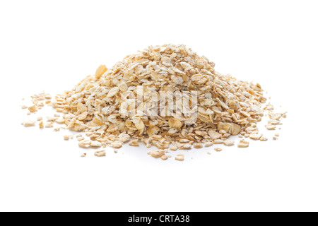 A pile of rolled oats on a white background with soft natural shadow. Stock Photo