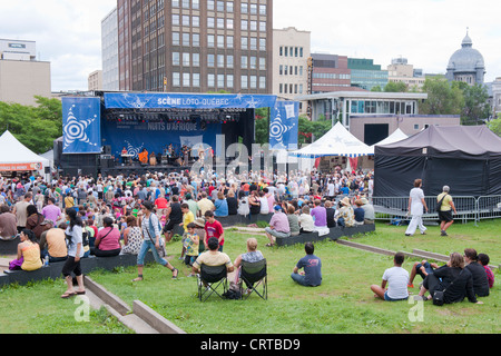 Crowd attending an outdoor concert given during the Nuits d'Afrique Festival in Montreal, province of Quebec, Canada. Stock Photo